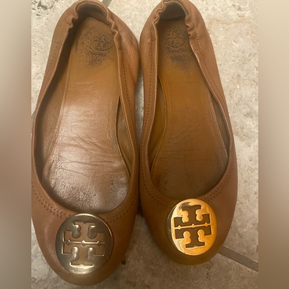 Well worn leather flats